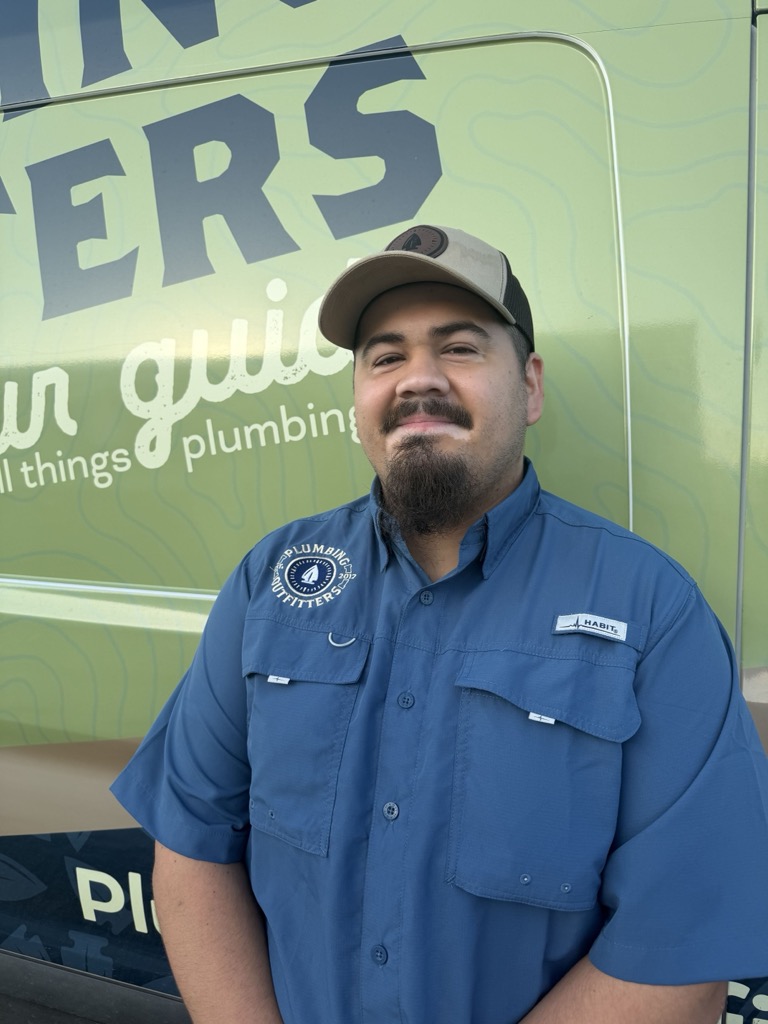 Portrait of Remy, Journeyman Plumber at Plumbing Outfitters
